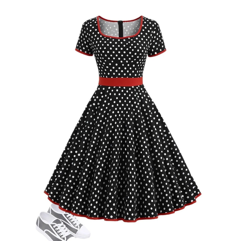 Multicolour polka dot dress with square collar, short sleeves, front zipper, and pleated midi skirt on a hanger.