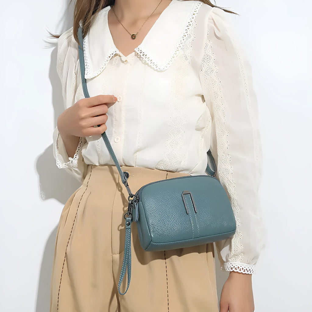 Genuine leather ladies shoulder bag in a horizontal square shape, shown in dark khaki colour.