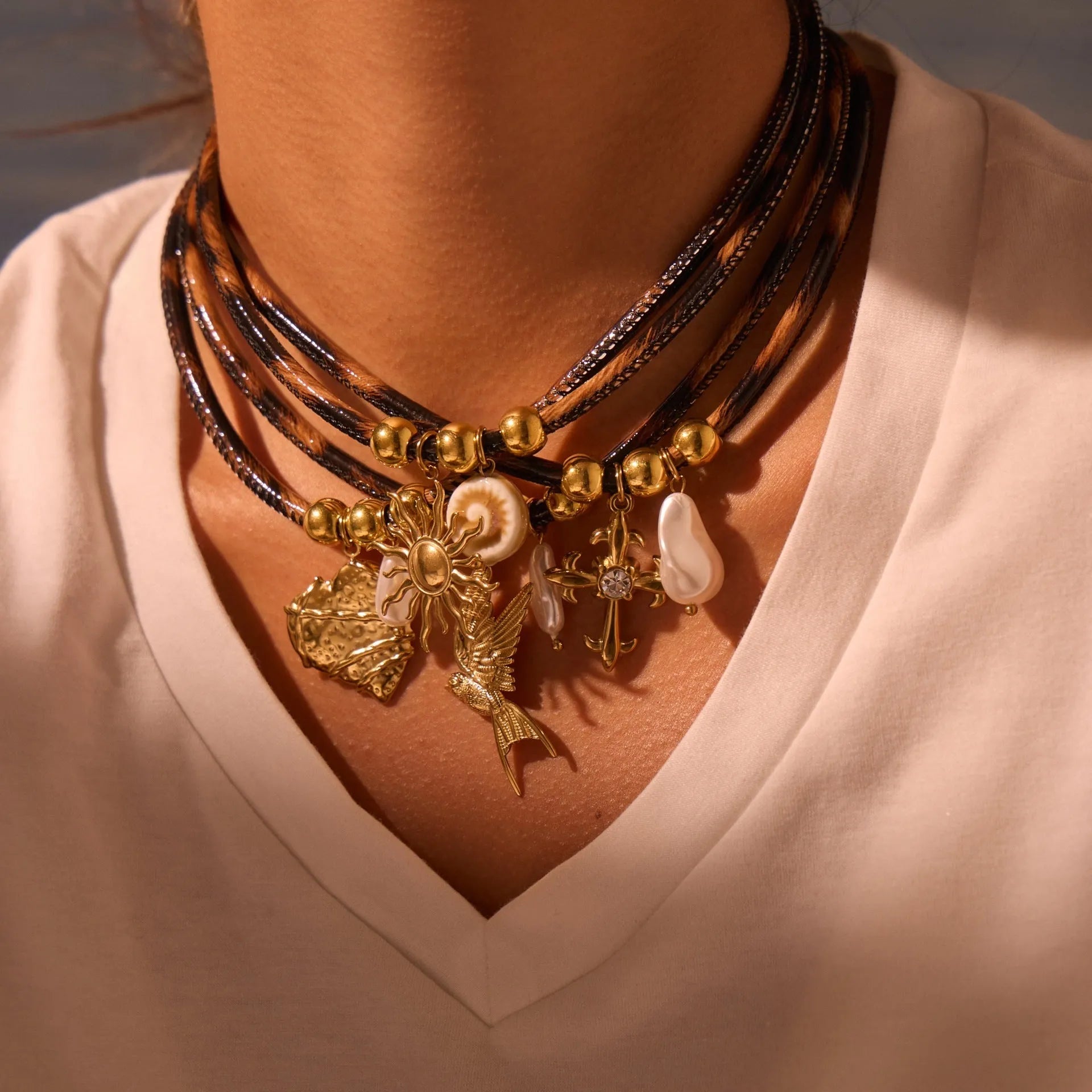 Geometric leopard pendant necklace on adjustable chain with 18K gold electroplated finish