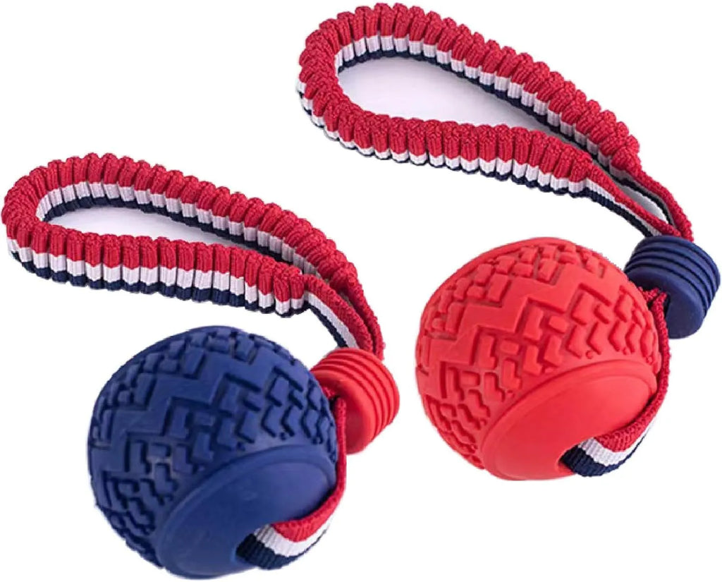 Blue dog ball with attached rope, showing textured surface and total length of 29 cm.