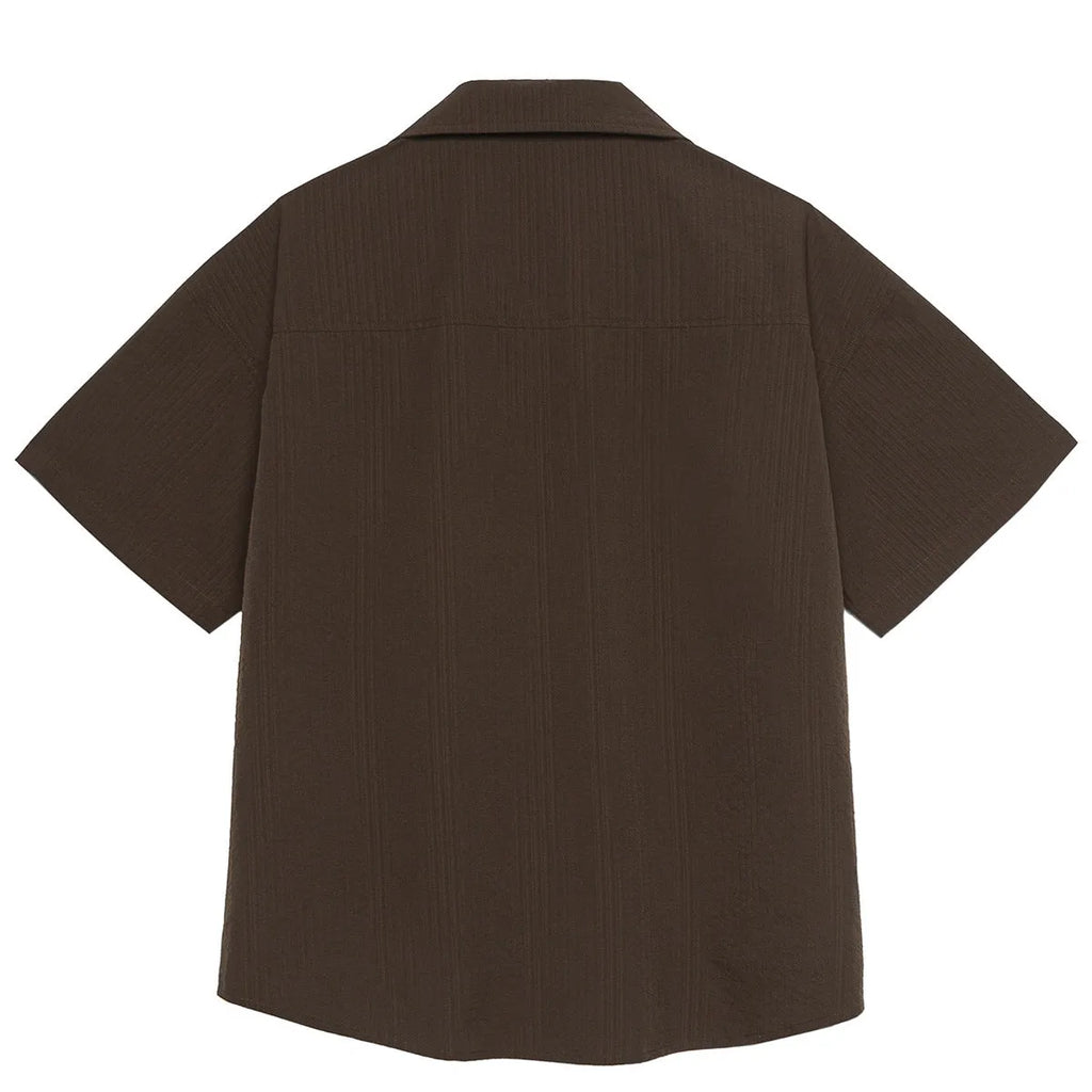 Brown striped men's short sleeve outdoor shirt with Cuban collar on a hanger