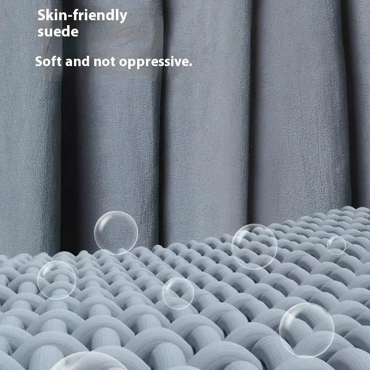 Blue mummy-style nylon sleeping bag unrolled, showing tapered design and matt fabric texture.