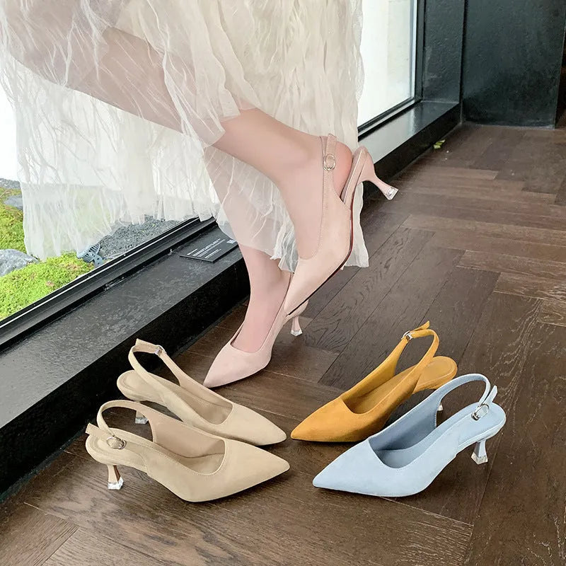 Women's suede pointed-toe stiletto high heels in apricot, pink, sky blue, and yellow colours on a rubber sole.