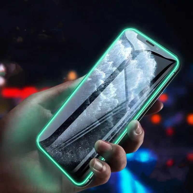 Luminous full cover tempered glass screen protector for iPhone glowing in the dark.