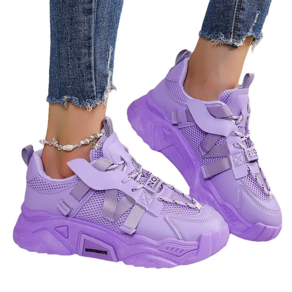 Women's purple green white pink yellow mesh platform sneakers with lace-up front and animal pattern.