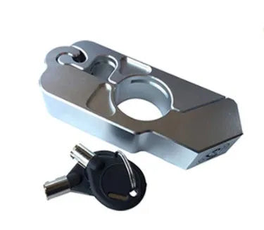 Black motorcycle handlebar lock with CNC aluminium body and stainless steel wire, shown attached to brake lever