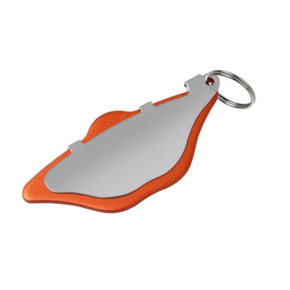 Black and orange metal mountain bike disc brake pads with an adjustment flap.