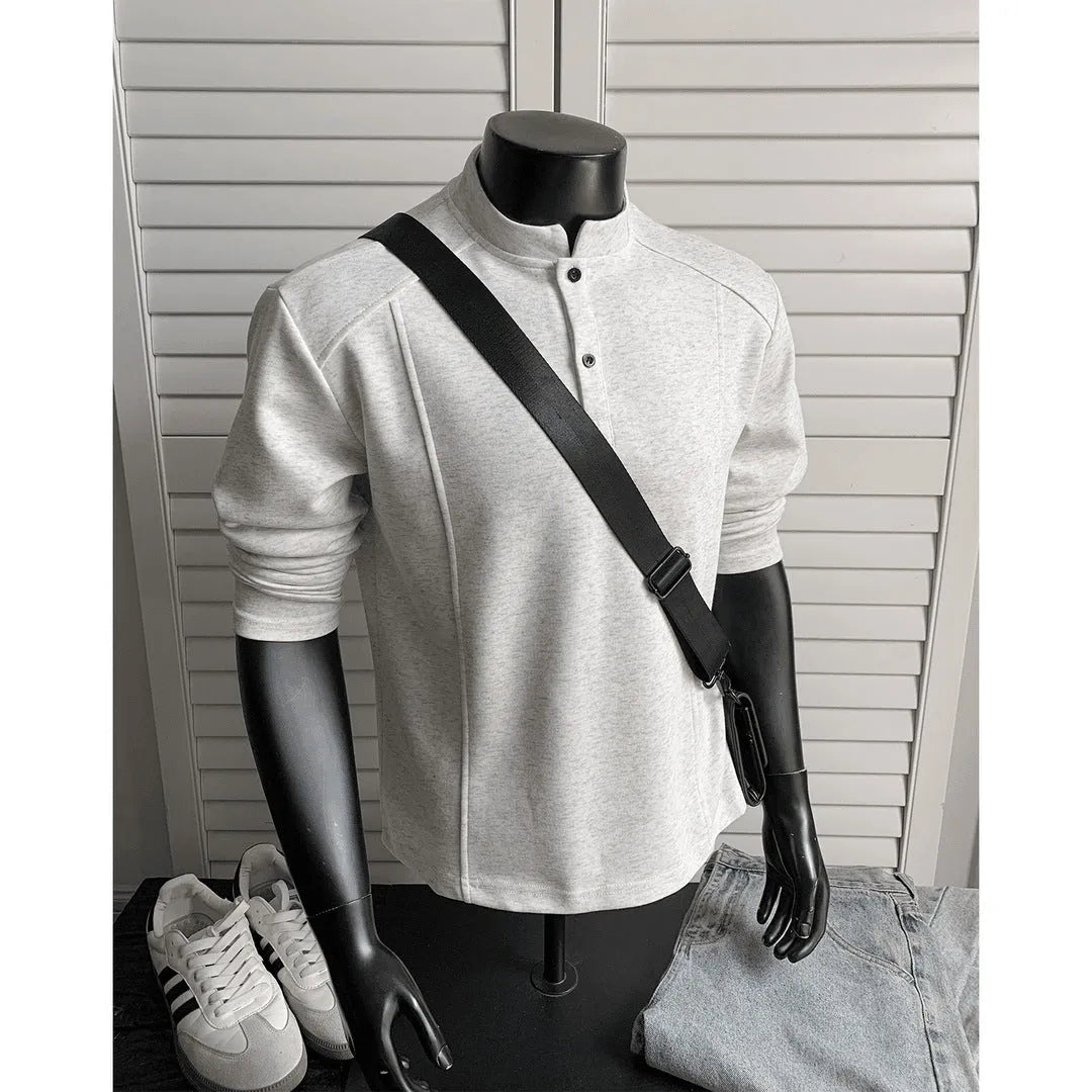 Men's grey asymmetric patchwork polo shirt with a stand-up collar, long sleeves, and a loose fit.
