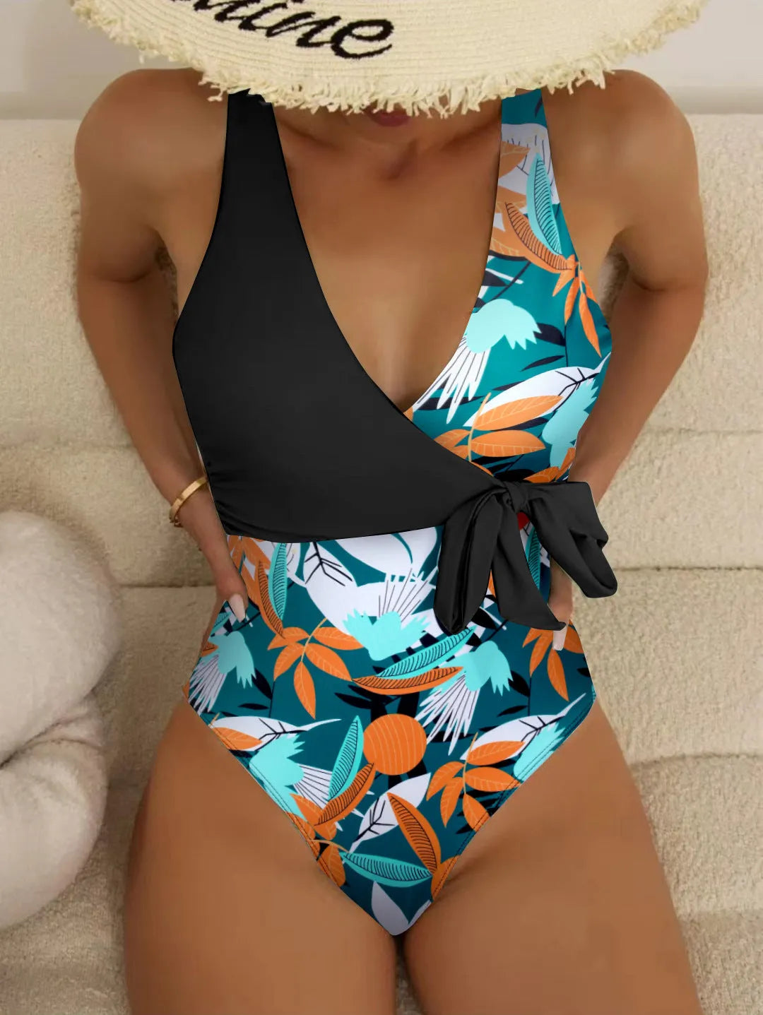 Women's high waist one-piece swimsuit in a printed pattern, shown in black and white colour options.