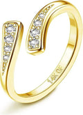 Gold plated alloy toe ring with rhinestone or water drop design on a toe.