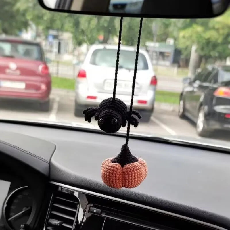 Plush hand-woven car hanging ornament in a cartoon design, made from soft polyester fabric.