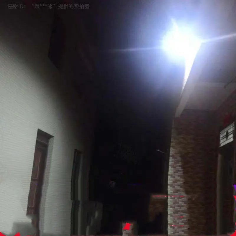 Black Cornucopia solar-powered LED flood light with remote control, mounted on an outdoor wall.