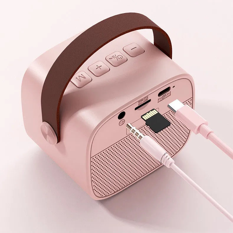 Compact wireless Bluetooth speaker with microphone in white, pink or blue colour options