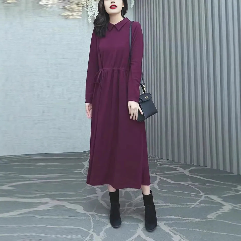 Purplish red long-sleeve maxi dress on a model, showing full-length 130-140cm skirt and urban style tailoring.