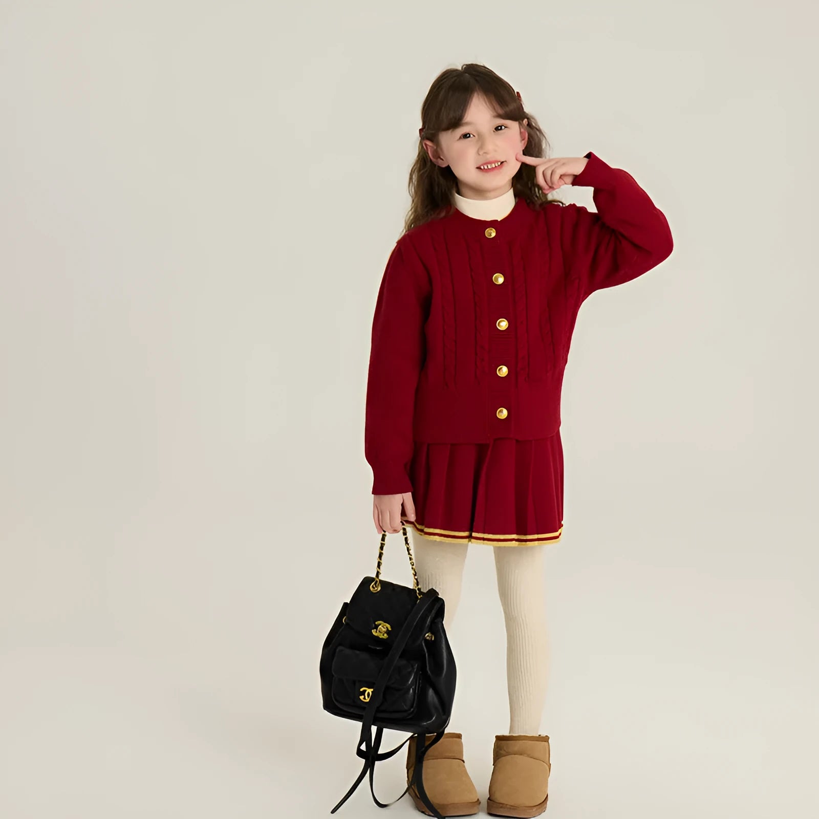 Red knit cardigan and pleated skirt two-piece set for girls in velvet yarn fabric