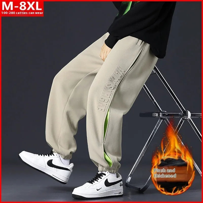 Men's loose-fit cotton trousers with ankle banded design in grey green colour
