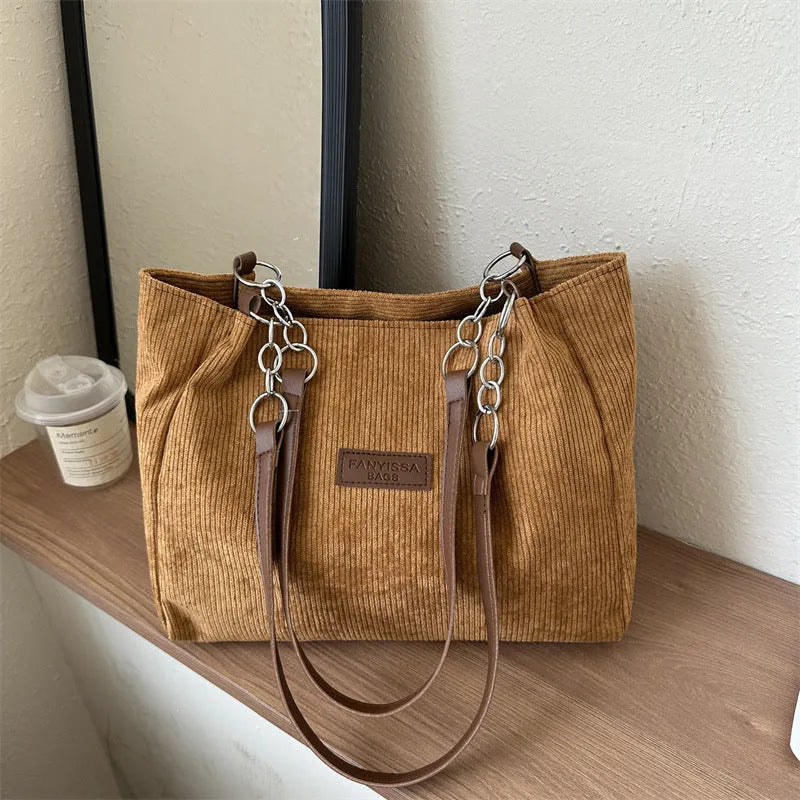 Corduroy one-shoulder tote handbag in black, brown, or white with horizontal square silhouette