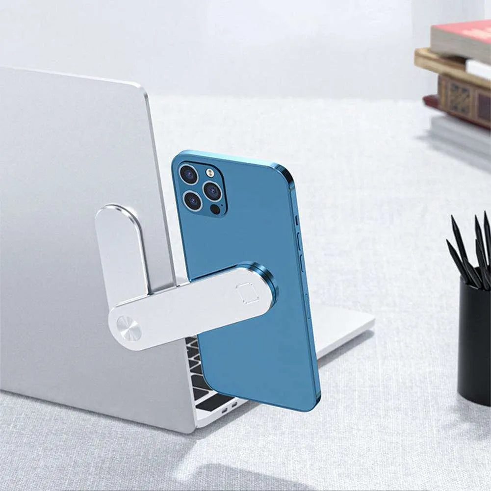 Black aluminium laptop phone holder with magnetic mount attached to laptop side displaying smartphone