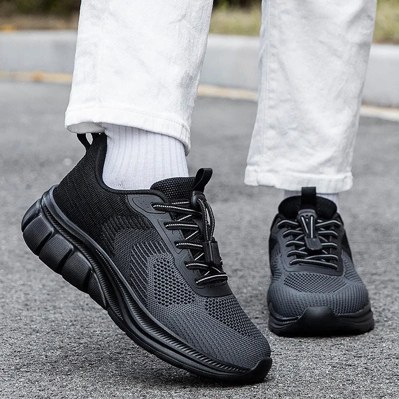 Knitted casual unisex sports shoes in solid colour with Flyknit upper and low flat heel