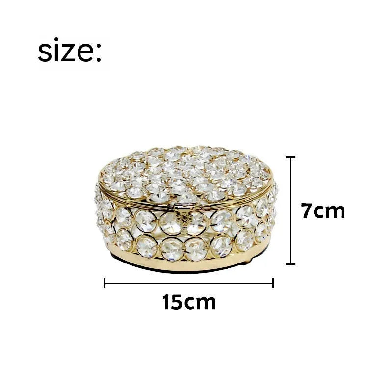 Crystal glass jewelry storage box with transparent sides and French gold metal frame