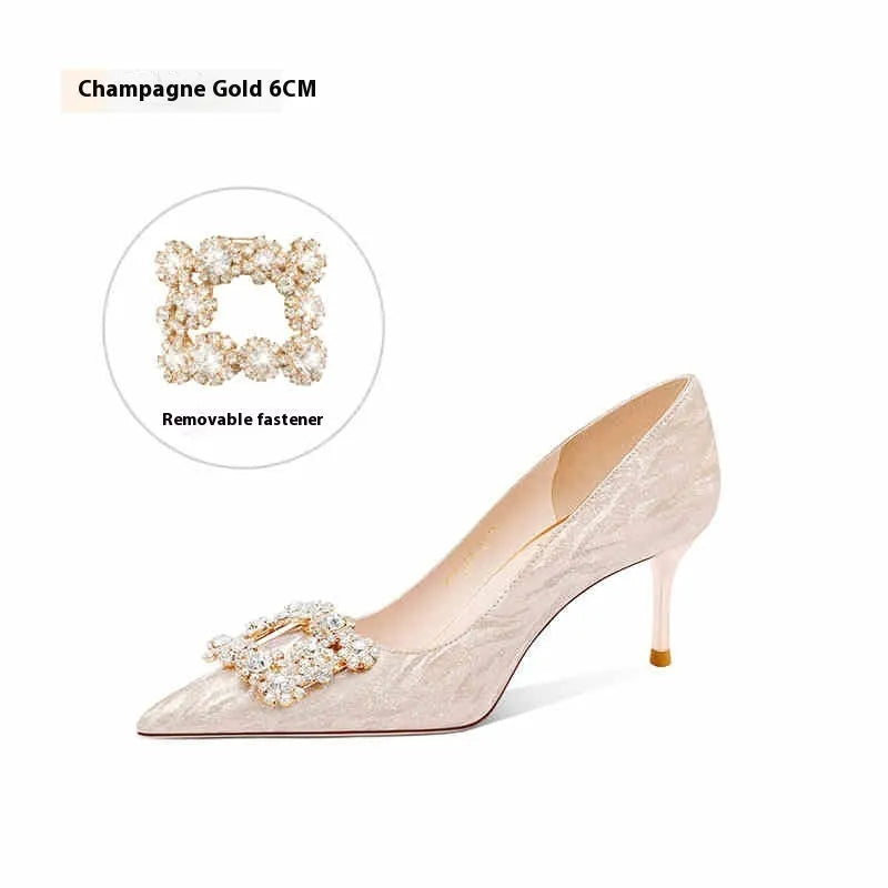 Champagne gold women's high heels with pointed toe and stiletto heel on white background
