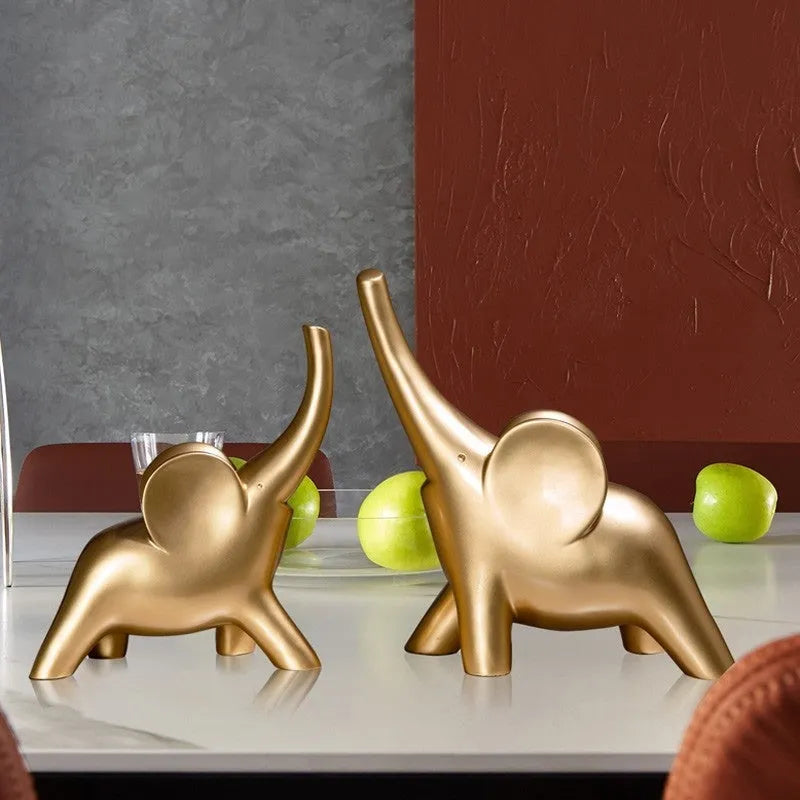 Modern minimalist resin elephant ornament in rose gold or white colour, available in large and small sizes.