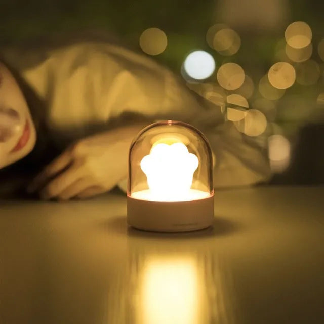 Grey and pink cat paw shaped USB rechargeable musical night light with adjustable brightness