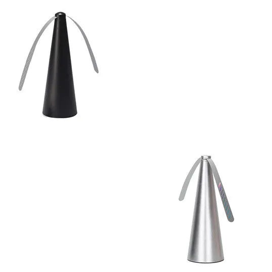Fly repellent fan with ABS housing, 8.2x8.2x24cm, on a dining table