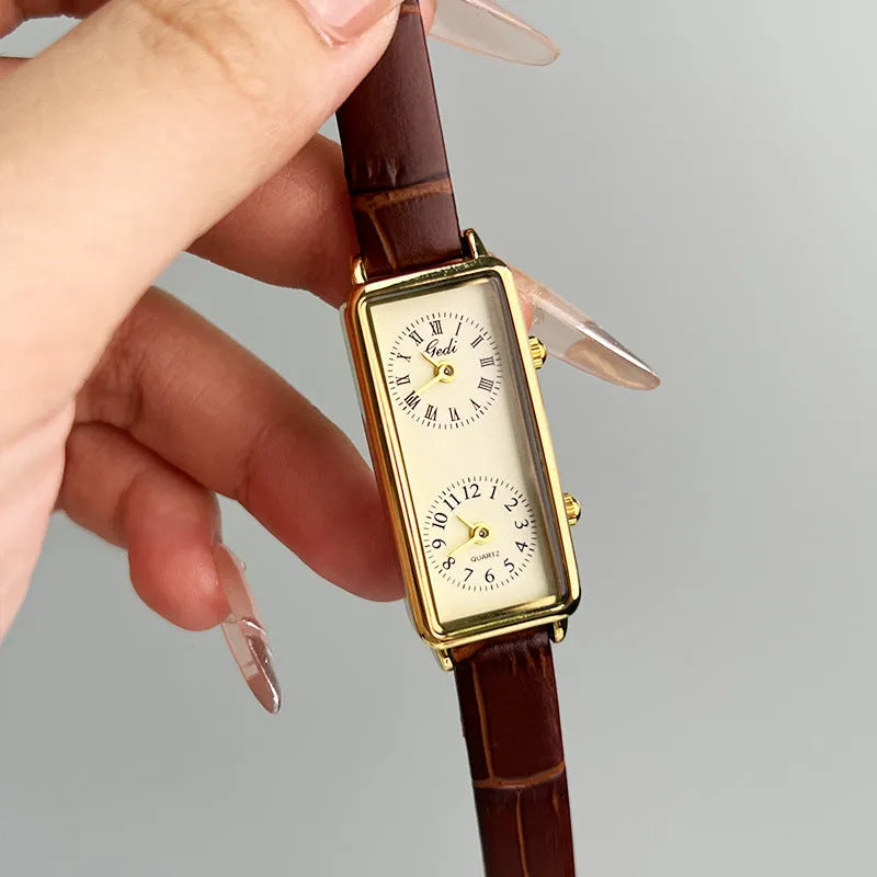 Women's double time zone quartz watch with retro rectangular case, double inserts, and 8.6mm thickness in silver or gold