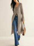 Khaki long sleeve cardigan coat with button front on a model