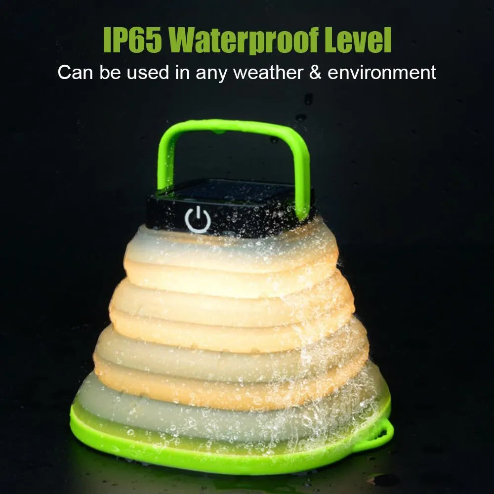 Collapsible camping lantern in Black or Green with solar panel, USB charging, 160lm warm white light, IP68 rating, and 2.5cm folded thickness