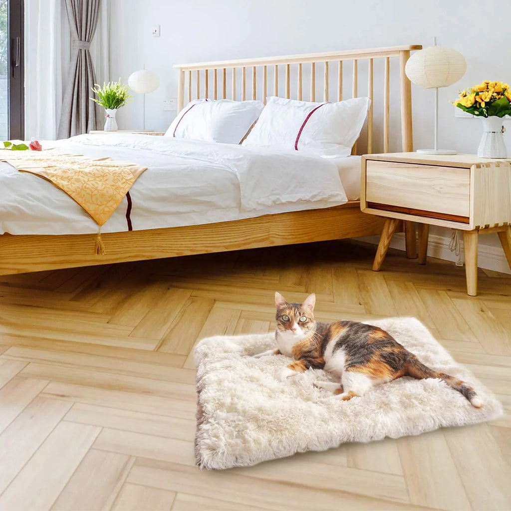 Grey and white pet blanket nest with long plush surface and black non-slip bottom