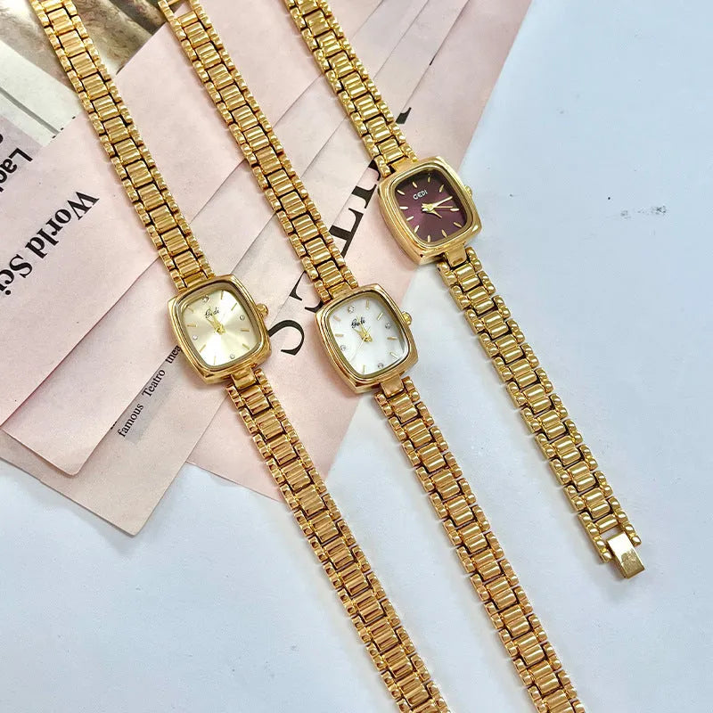 Small gold decorative watch with alloy case and strap, 8mm thick, gold face