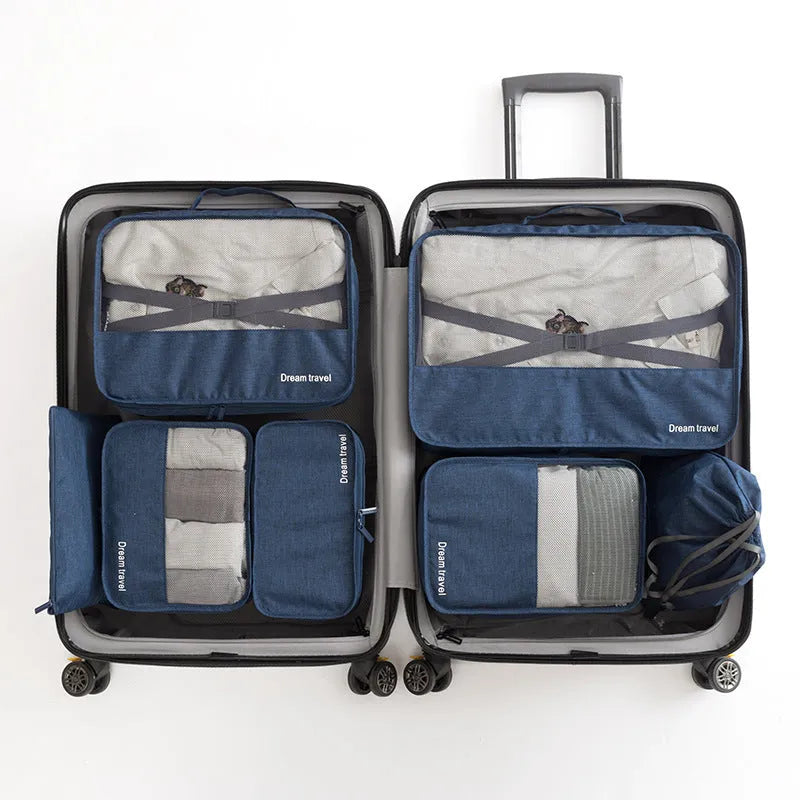 Set of 7 waterproof nylon travel tote bags in black, gray, dark blue, blue, and orange showing different sizes