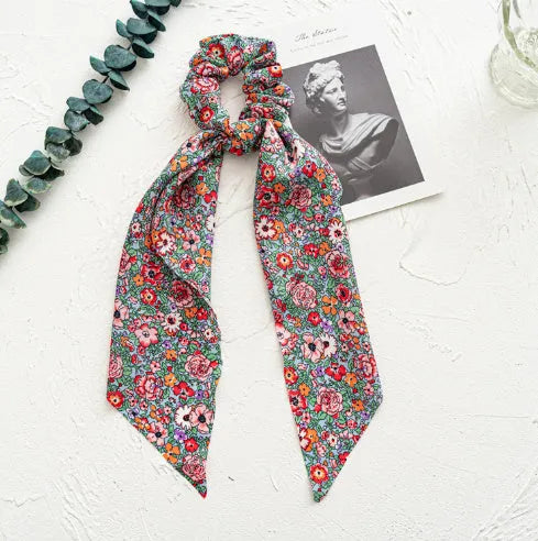 Spring dark green cloth hair band with large intestine ring shape and long ribbon for ponytail or headwear.