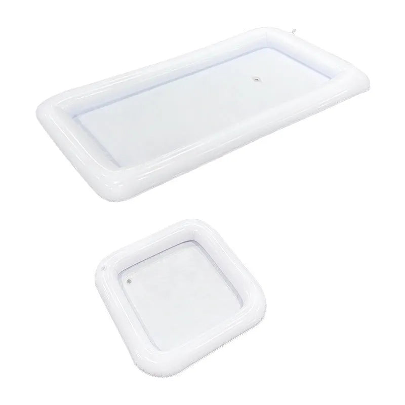 Inflatable white ice bar for parties with cup holders, shown at full size after inflation.