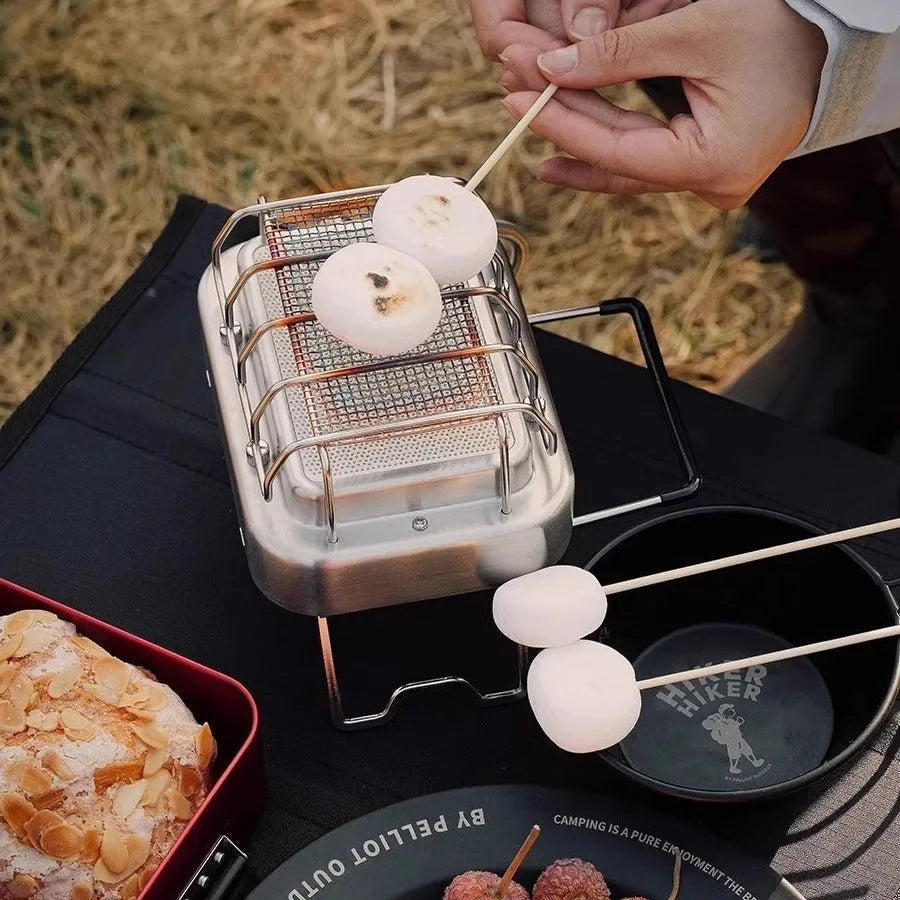 Portable stainless steel electric heating stove with ceramic elements, shown with dimensions.
