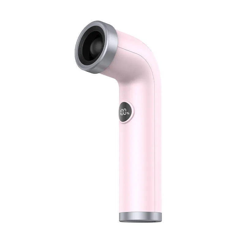 Compact apricot-coloured bladeless personal desk fan with smooth rounded housing and no visible blades.