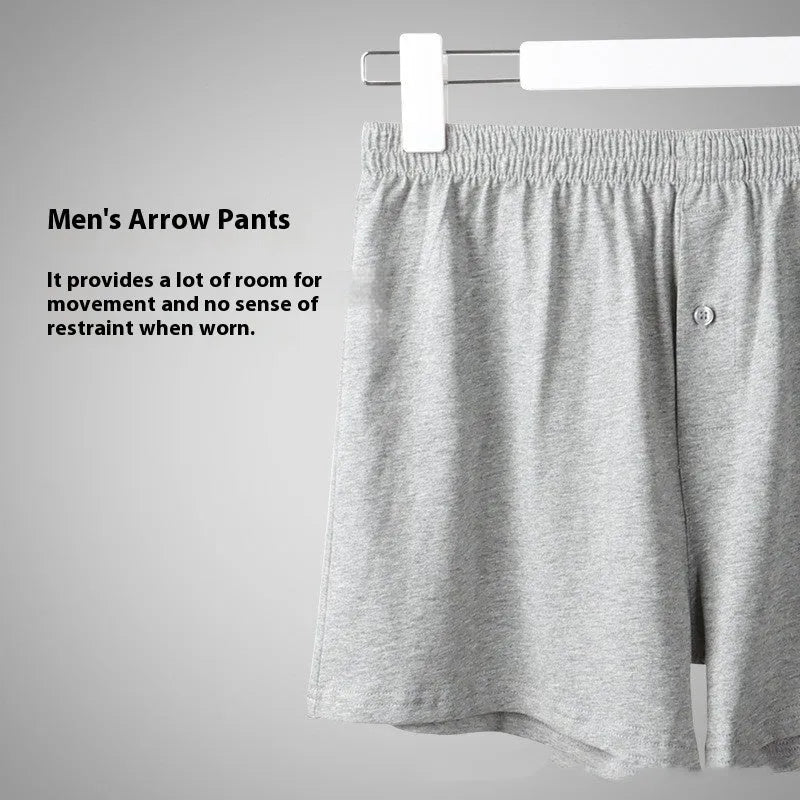 Men's light grey high-waist cotton loose boxer shorts laid flat.