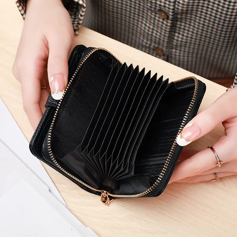 Women's lychee pattern PU short wallet in beige, pink, black, or red with antibacterial lining.