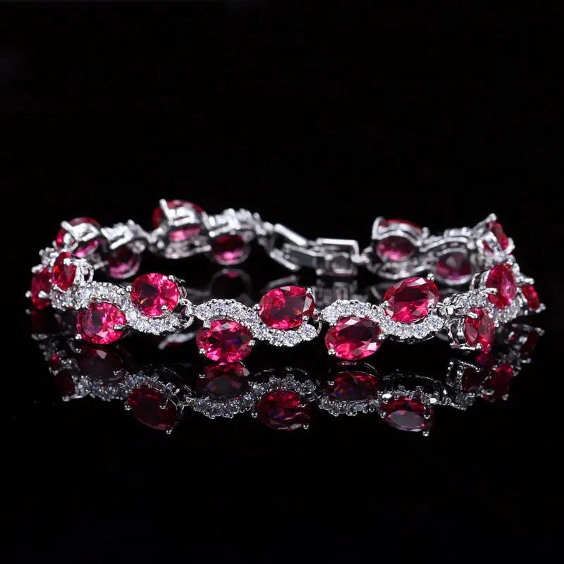 Copper-plated gold bracelet with AAA+ zircon stones in geometric design, 18.4 cm length