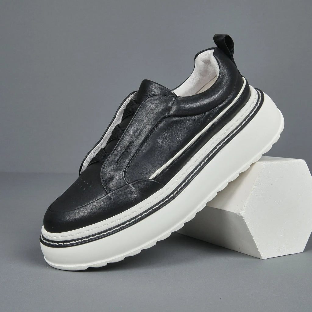 Breathable casual slip-on sneaker with first layer cowhide upper and foam sole, black, side view