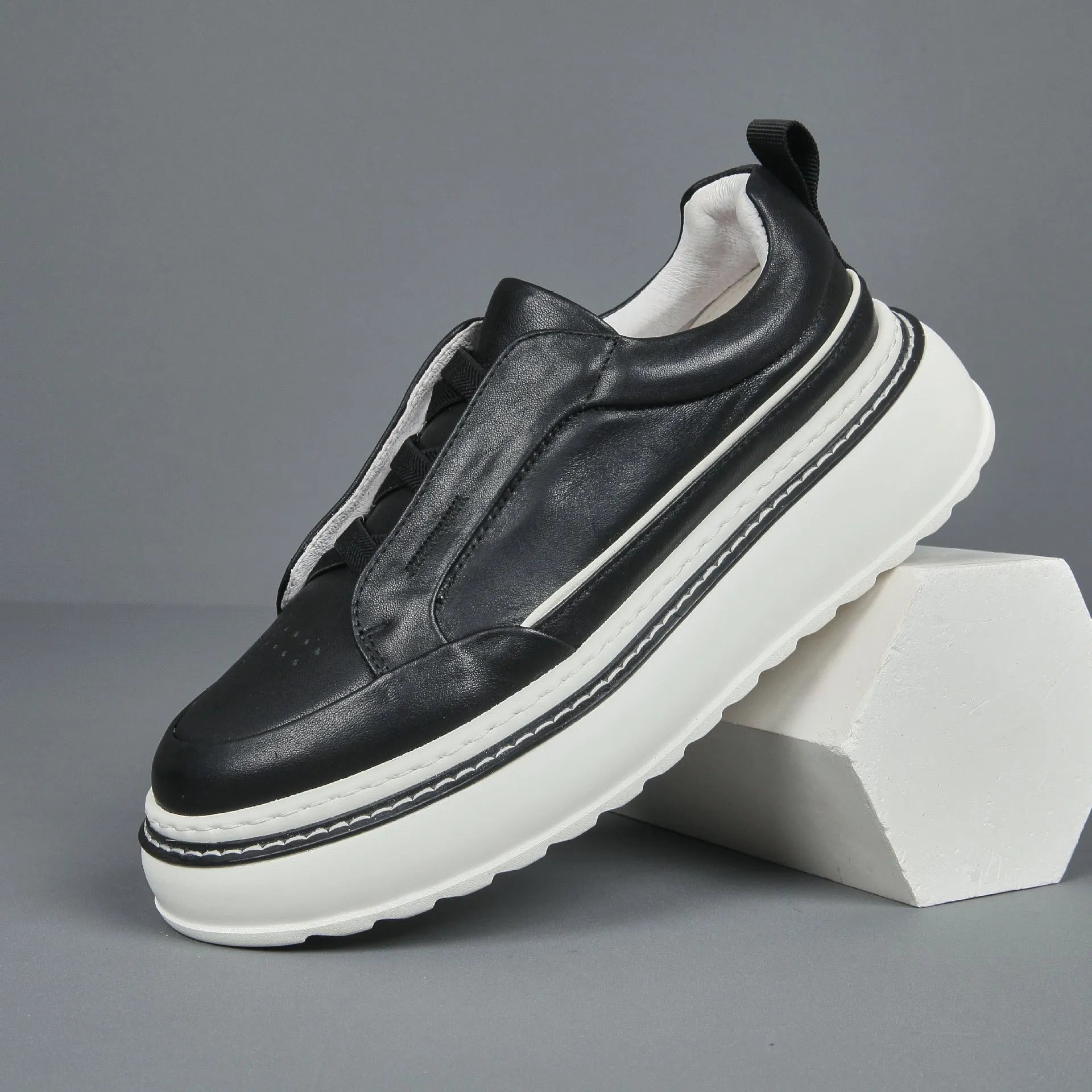 Breathable casual slip-on sneaker with first layer cowhide upper and foam sole, black, side view