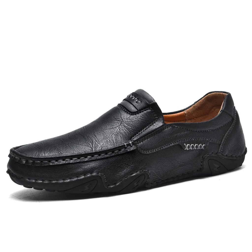 Casual slip-on shoes in multiple colours with a microfiber upper and flat rubber sole.