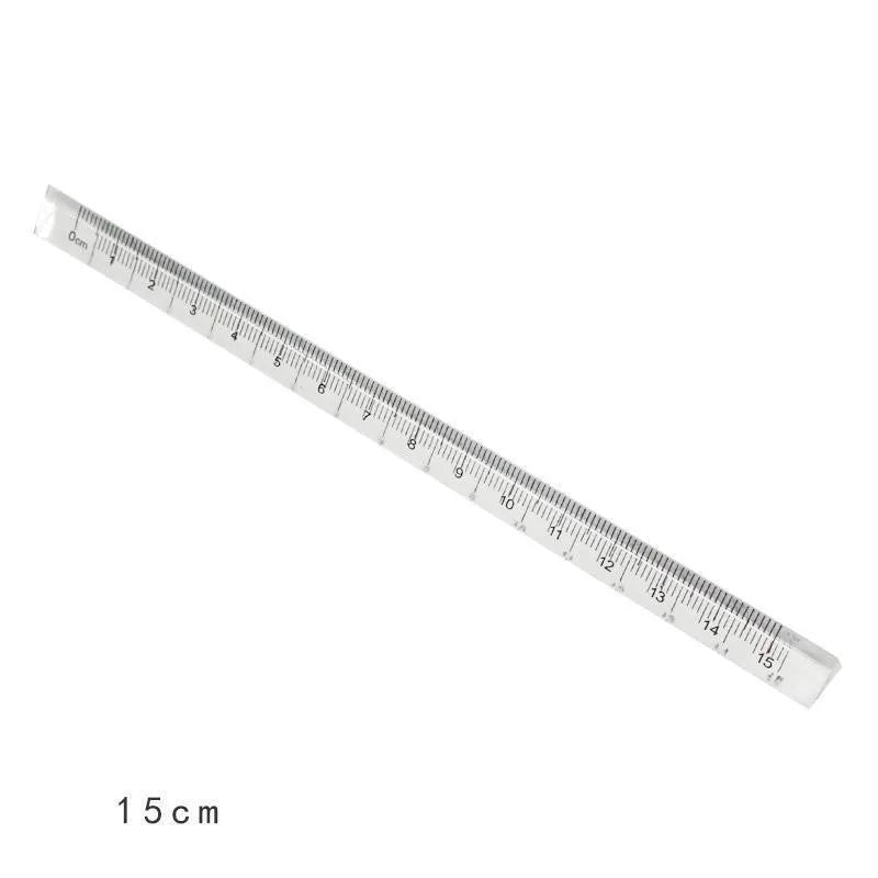 White plastic ruler 15cm on white background for primary school measuring