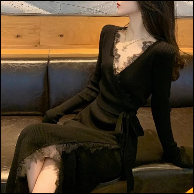 Women's solid black slim fit wool princess dress skirt on a hanger.