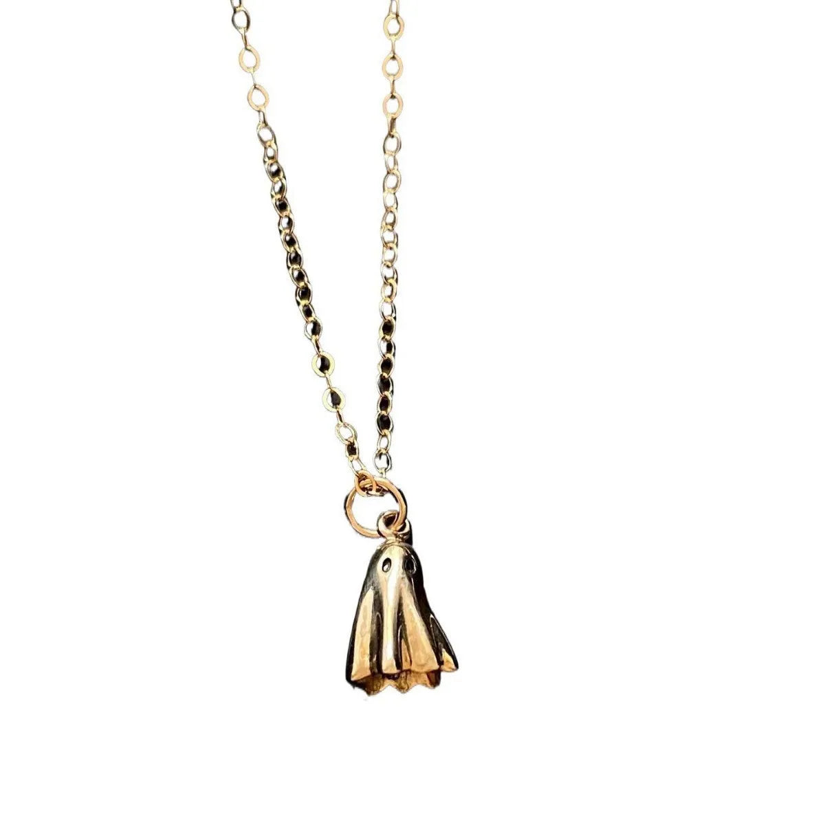 A modern ghost pendant necklace on a stainless steel chain, showing the titanium steel electroplated pendant detail.
