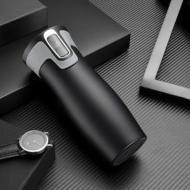 450ml vacuum insulated stainless steel travel mug with leak-proof push-button lid, shown in black, blue, or true colour