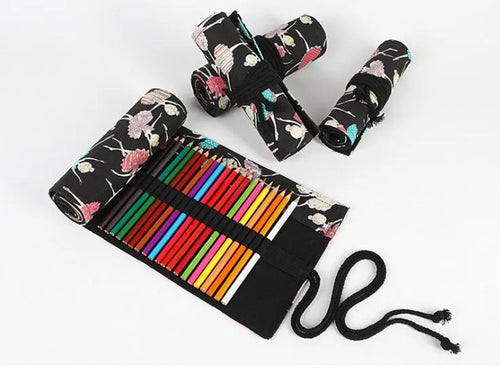Square canvas rolling pencil case with ballet girl print, unfurled to show multiple pencil slots.