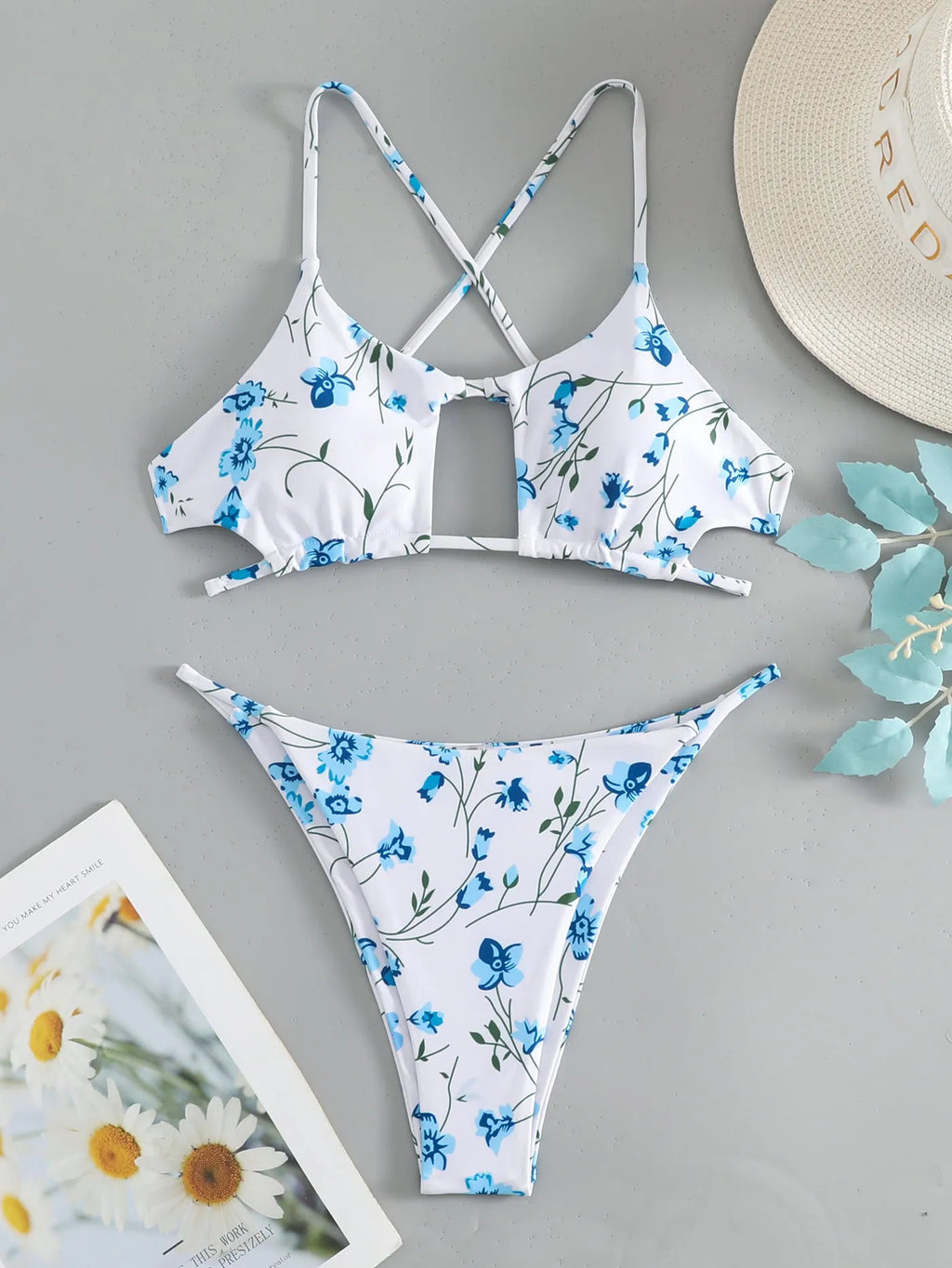 Women's floral pattern swimsuit with tie-neck triangle top and matching shorts
